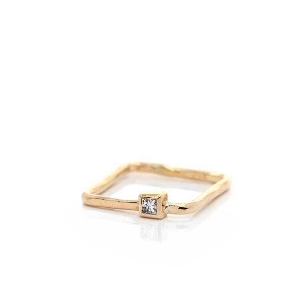 Square ring with princess champagne diamond